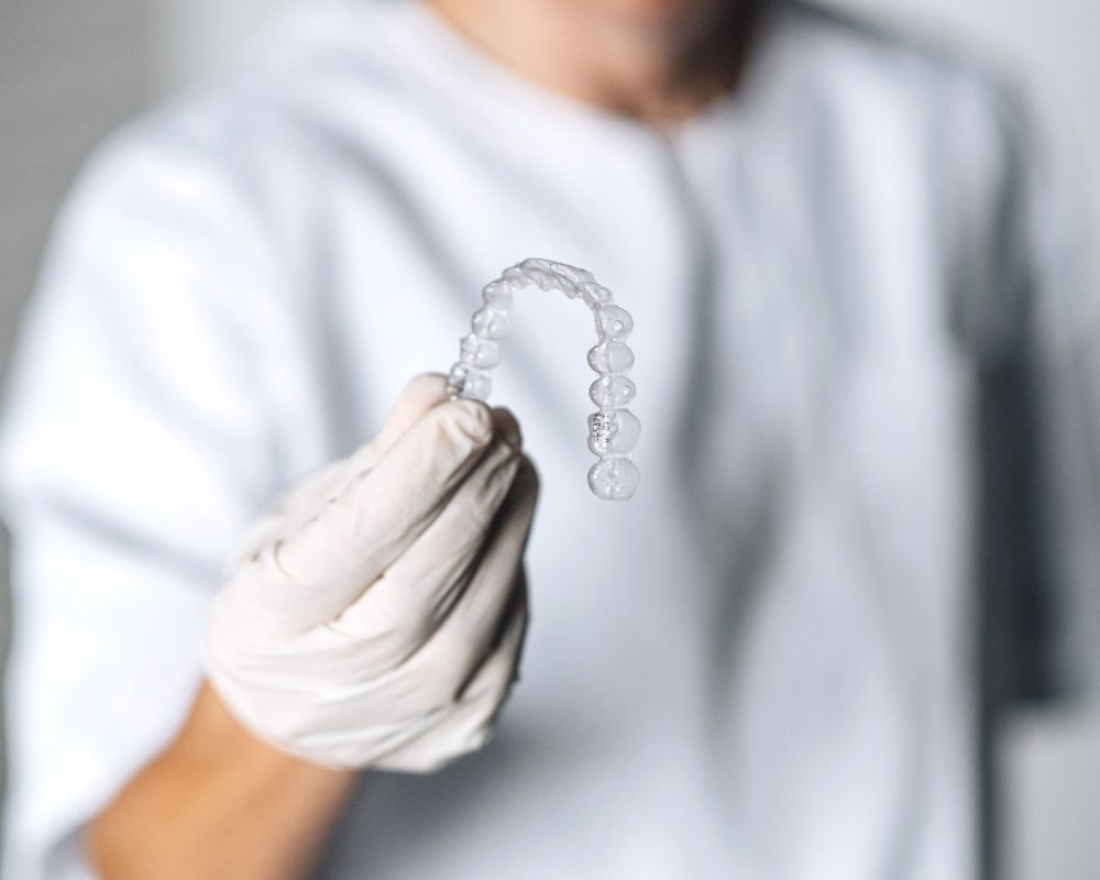 People in a dental lab working in the fabrication process of den